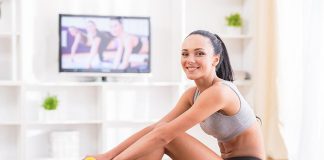 Fit woman does home workouts