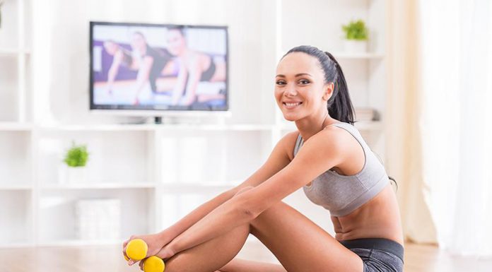 Fit woman does home workouts