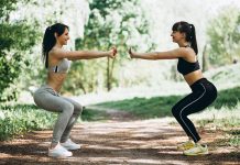 Two fit women warming up-cooling down