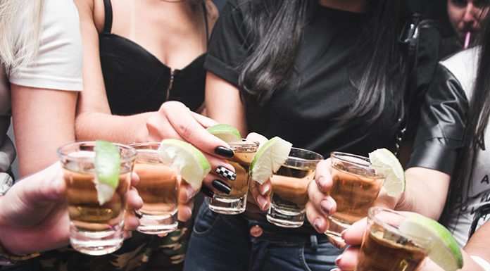 How Does Alcohol Affect Exercise? Young girls drinking alcohol