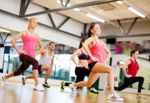 Fit young women doing aerobics