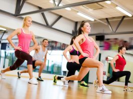 Fit young women doing aerobics