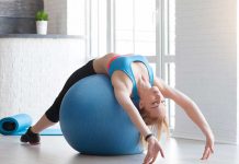 Benefits of Using a Stability Ball in Your Training Fit sportswoman doing pilates with stability ball
